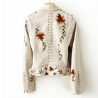 Valentina retro floral embroidered vegan leather jacket with stud accents by Lumina Wear, showcasing detailed embroidery and stylish design.
