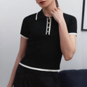 Valentina Lumina Wear structured ribbed knit top with contrast lapel, featuring a fitted silhouette and stylish design.