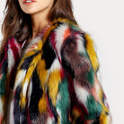 Vibrant multi-colored faux fur coat with open front from Lumina Wear, styled on a mannequin, showcasing bold, textured fur design.