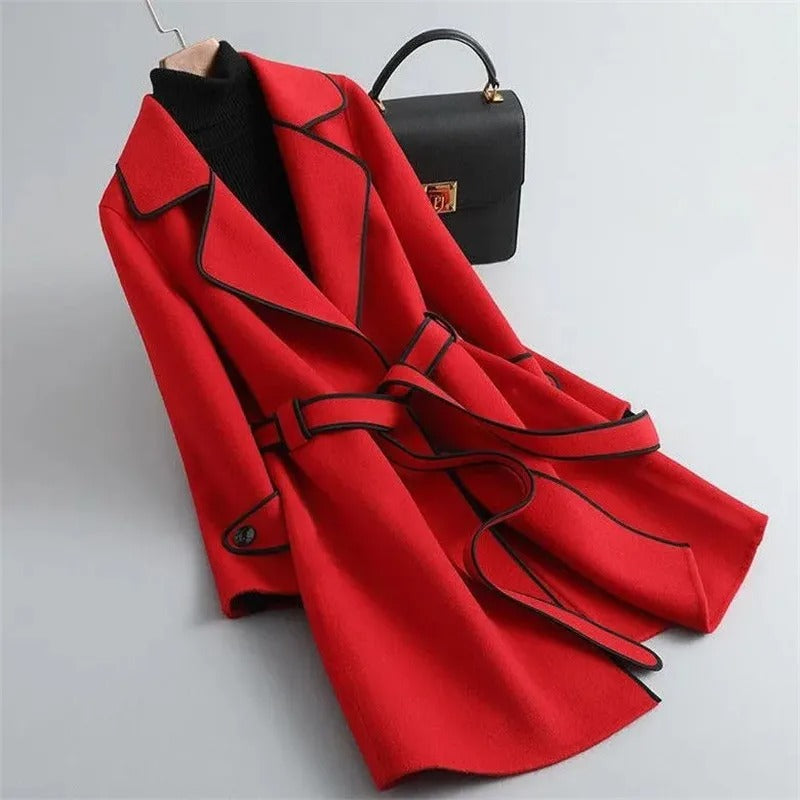 Black trench coat with contrast piping, elegant design by Lumina Wear, featuring tailored fit and classic style.