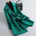 Elegant black trench coat with contrast piping from Lumina Wear, showcasing a tailored design and stylish details.