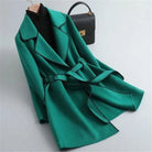 Black Verona trench coat with contrast piping by Lumina Wear, stylish and elegant with a tailored fit and classic design.