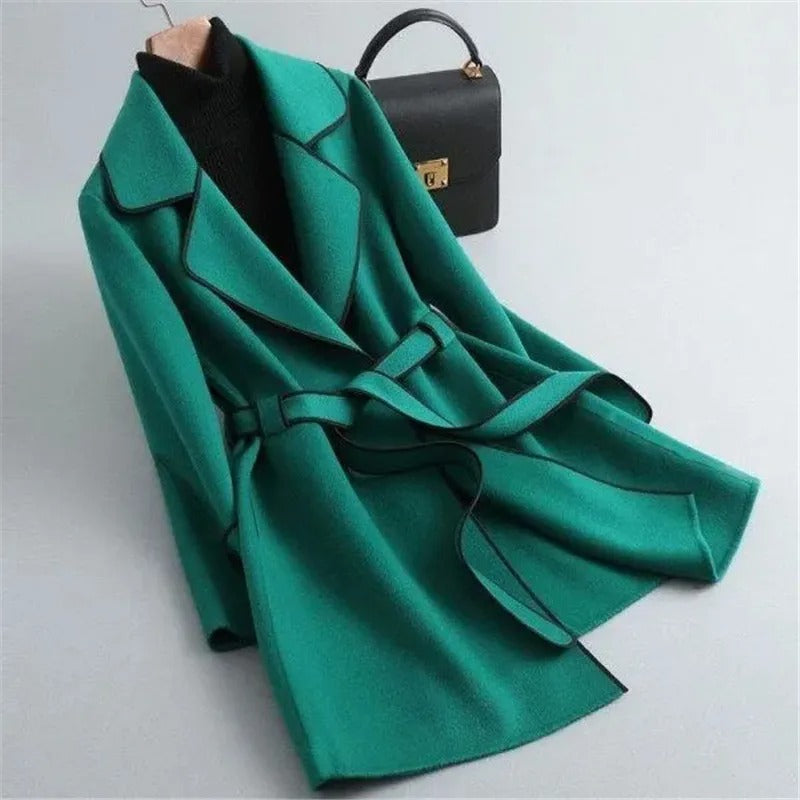 Black Verona trench coat with contrast piping by Lumina Wear, stylish and elegant with a tailored fit and classic design.