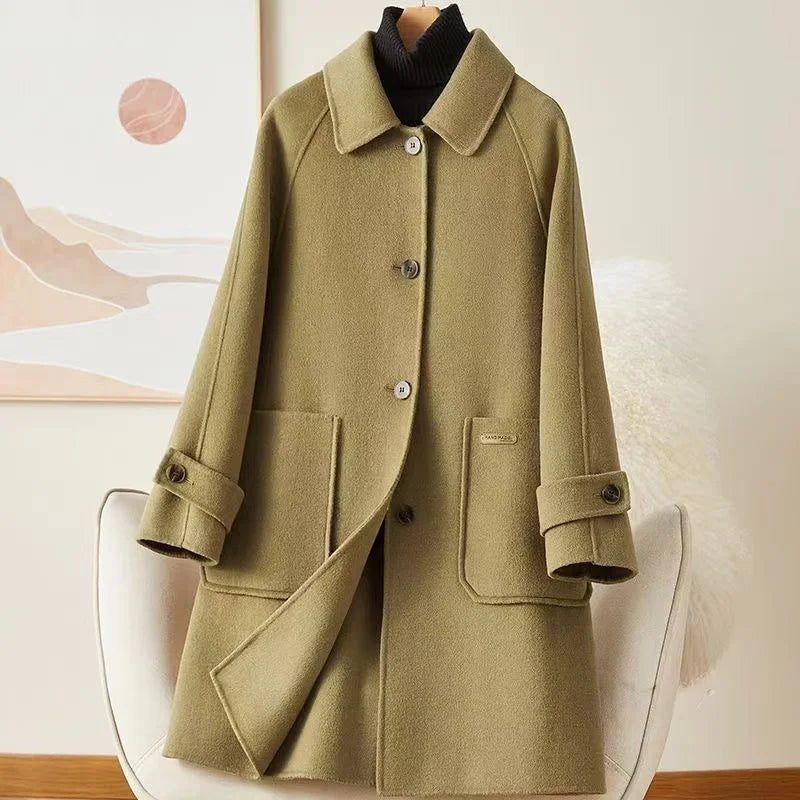 Lumina Wear Victoria classic warm winter coat with front pockets, featuring a stylish and cozy design for cold weather.