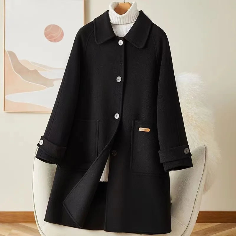 Lumina Wear Victoria warm winter coat with front pockets, stylish and cozy for cold weather, in a classic design.
