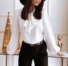 Lumina Wear Victoria women's blouse featuring an elegant bow tie and puffed sleeves, stylish and sophisticated for fashionable wear.