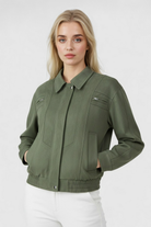Elegant green bomber jacket by Lumina Wear, showcasing a stylish and timeless design with a fitted silhouette.