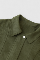 Victoria green bomber jacket by Lumina Wear, stylish and elegant with a timeless design, shown in a close-up image.