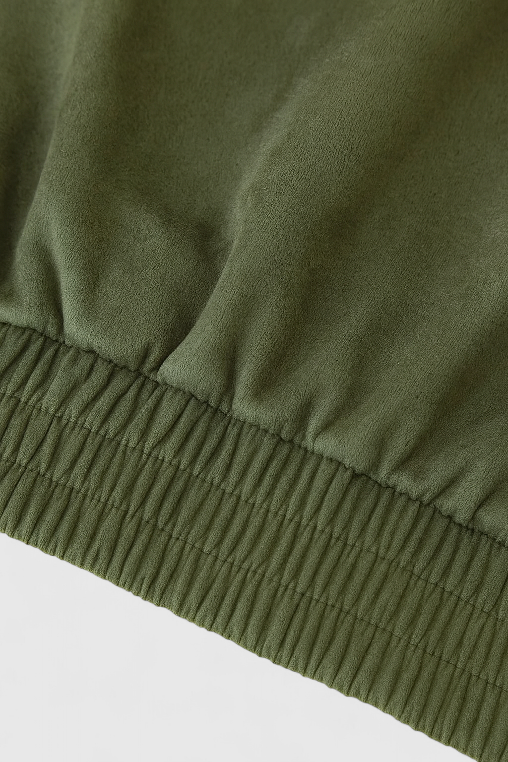 Elegant green bomber jacket from Lumina Wear, featuring a stylish fit and timeless design perfect for casual or chic outfits.