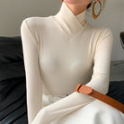 Lumina Wear Victoria women's mock neck top with a streamlined fit, elegant design, and smooth fabric, suitable for sophisticated casual wear.