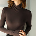 Lumina Wear Victoria elegant mock neck top featuring a streamlined fit, displayed on a neutral background.