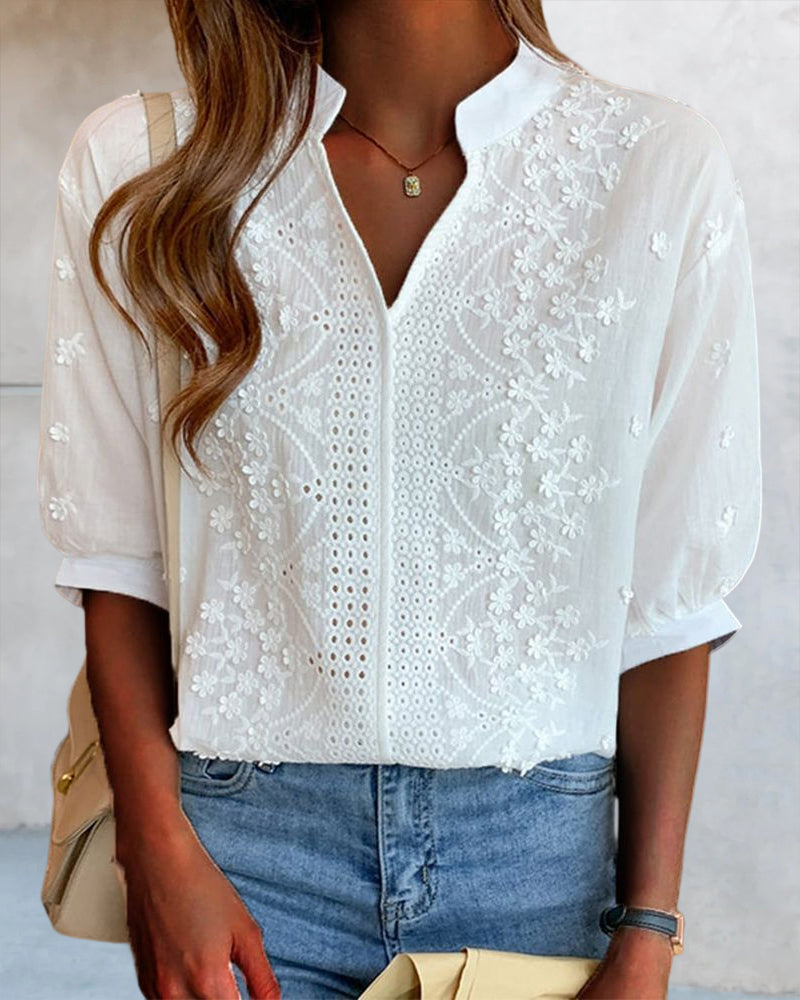 Lumina Wear Victoria puff sleeve blouse with V-neck design, featuring elegant fabric and stylish silhouette for a sophisticated look.