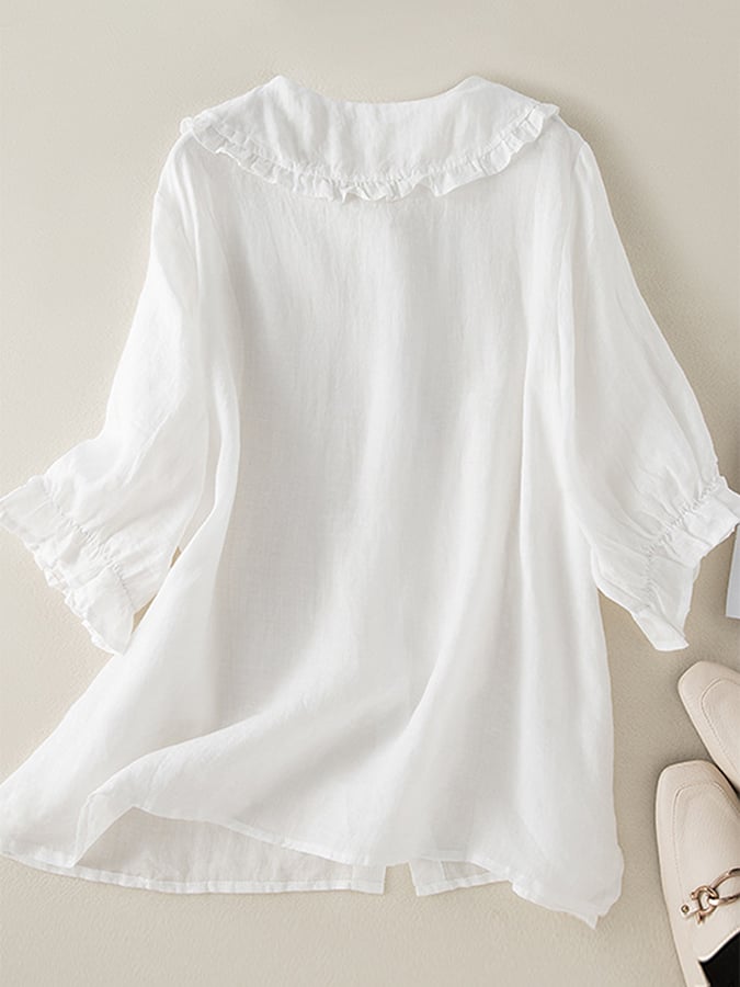 Light blue Lumina Wear Victoria relaxed fit ruffle collar women's top with short sleeves, perfect for effortless summer style.