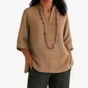 Lumina Wear Victoria relaxed linen tunic top with minimalist design, featuring a loose fit and neutral color, perfect for casual wear.