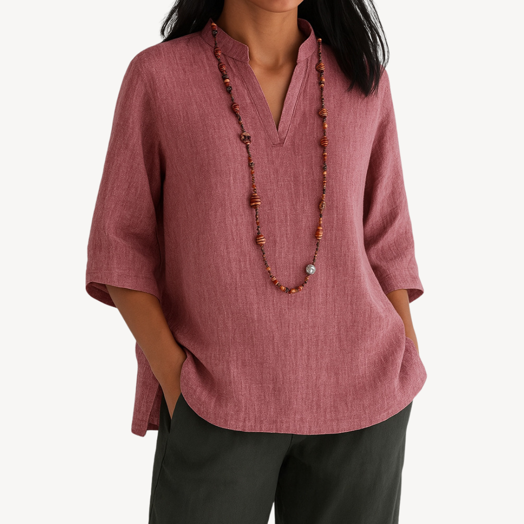 Light beige Victoria linen tunic top by Lumina Wear featuring a relaxed fit and minimalist design, displayed on a neutral background.