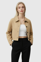 Retro-inspired Lumina Wear Victoria short jacket with button closure, stylish lightweight outerwear for casual wear.
