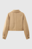 Retro-inspired Victoria short jacket by Lumina Wear featuring button closure and stylish design, perfect for casual wear.