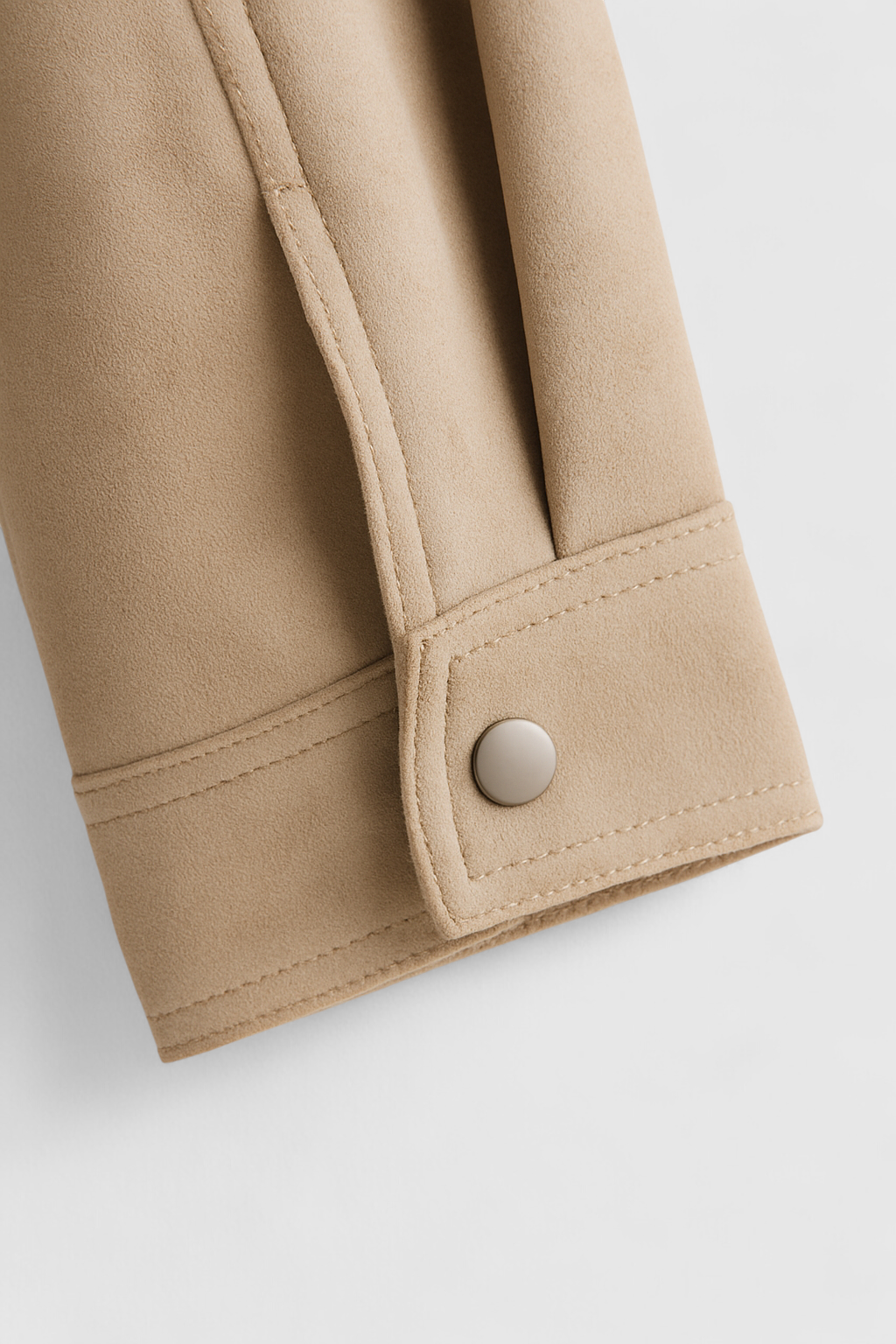 Stylish beige bomber jacket with stand collar from Lumina Wear, featured on the Victoria model.