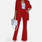 Elegant women’s tailored double-breasted blazer and pants set by Lumina Wear, featuring a sophisticated design and structured fit.