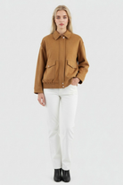 Trendy brown suede bomber jacket from Lumina Wear, featuring a classic fit and stylish design, perfect for casual wear.