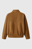 Lumina Wear Victoria brown suede bomber jacket, stylish and timeless, shown on a model highlighting the jacket's trendy design and texture.