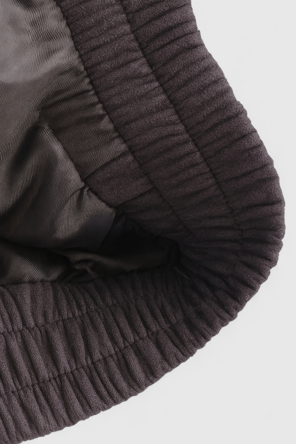 Dark gray Victoria bomber jacket with stand collar by Lumina Wear, featuring a stylish, trendy design and fitted silhouette.