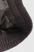 Dark gray Victoria bomber jacket with stand collar by Lumina Wear, featuring a stylish, trendy design and fitted silhouette.