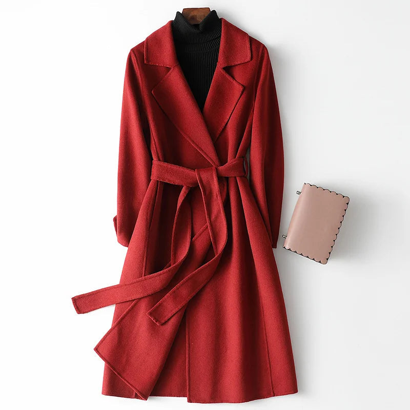 Women's Virginia Wool Coat by Lumina Wear featuring an elegant A-line silhouette and belted design, perfect for sophisticated winter wear.