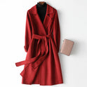 Elegant Virginia Lumina Wear wool coat with A-line silhouette and belted design, perfect for stylish winter wear.