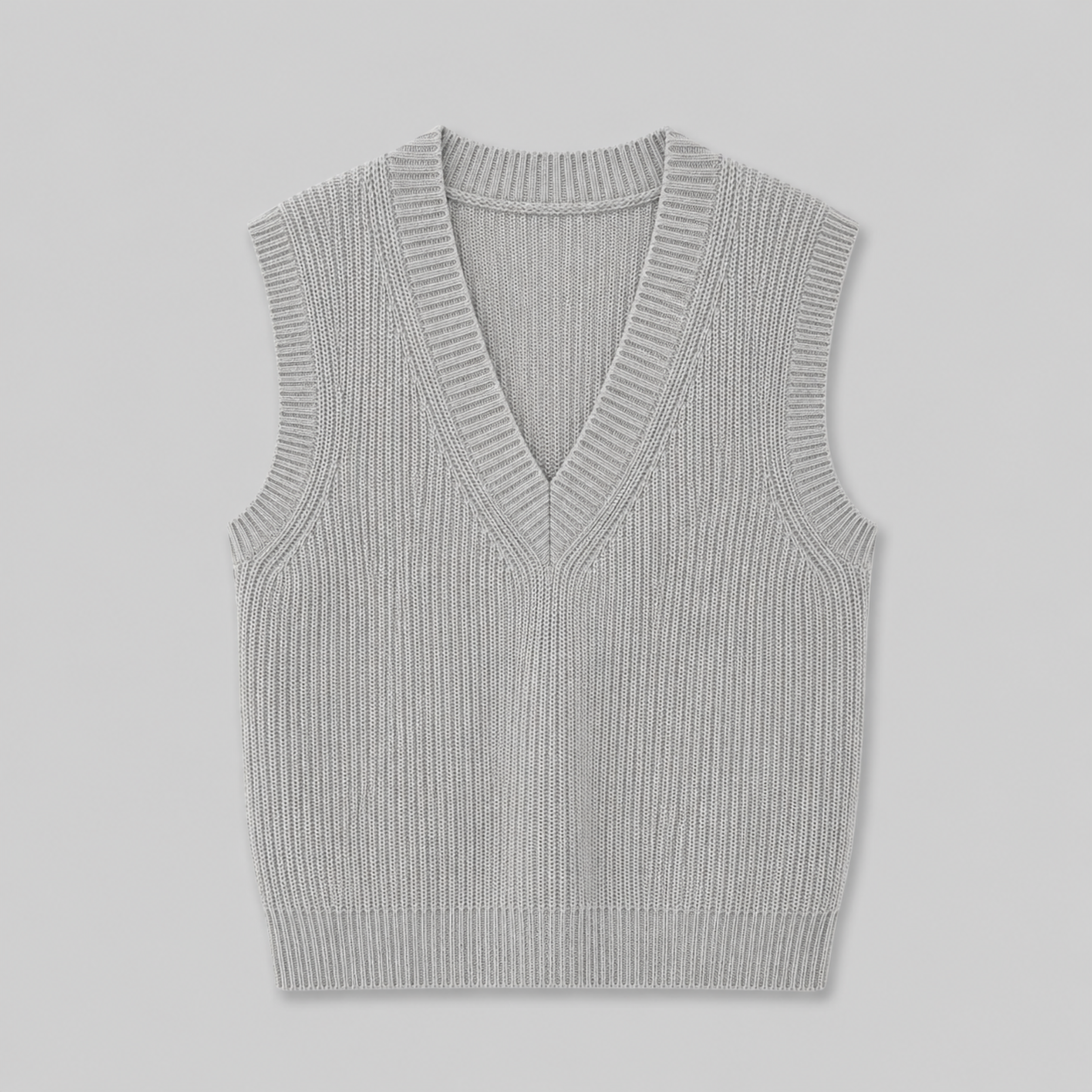 Lightweight ribbed V-neck knit vest in relaxed fit by Lumina Wear, modeled in neutral tones, showcasing textured fabric and comfortable style.