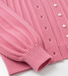 Lumina Wear Sophia pink knit cardigan with open front, cozy sweater featuring long sleeves and a relaxed fit.