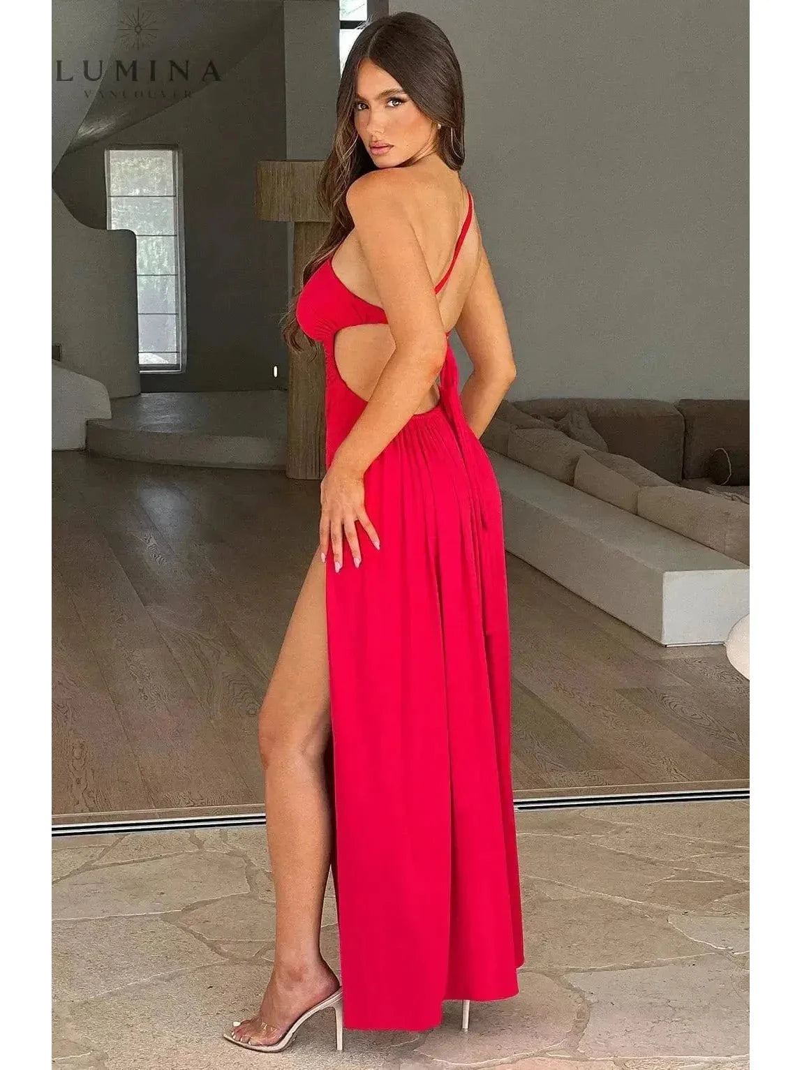 Red Adalyn maxi dress by Lumina Vancouver, elegant wedding guest dress with flowing fabric and sleeveless design.