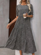 Beige Adelina™ tiered puff sleeve dress by Lumina Vancouver, featuring layered fabric and elegant puff sleeves.