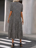 Beige Adelina™ tiered puff sleeve dress from Lumina Vancouver, showcasing its layered design and elegant puff sleeves.