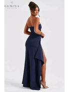 Black Ailiana Radiance Split Dress by Lumina Vancouver, showcasing elegant design and flowing fabric on a model.