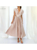 Elegant champagne evening dress by Lumina Wear, Alexia style, featuring a sophisticated design perfect for wedding guests.