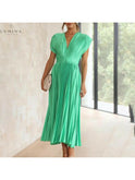 Lumina Wear Alexia elegant champagne evening dress, sleeveless design, perfect for wedding guests and formal occasions.