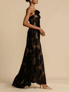 Black Alice Flower Maxi Dress by Lumina Vancouver, elegant wedding guest dress with floral pattern and flowing silhouette.