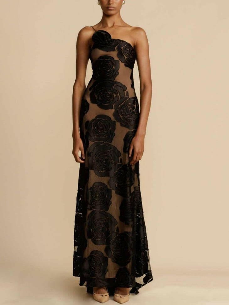 Black Alice flower maxi dress by Lumina Vancouver, elegant wedding guest dress with floral pattern and flowing silhouette.