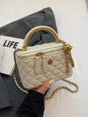 White quilted Lumina Wear Alice crossbody handbag with adjustable strap, stylish and compact for everyday use.