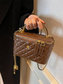 White Lumina Wear Alice quilted crossbody handbag with adjustable strap, stylish and compact for everyday use.