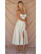 Yellow Alina waist dress by Lumina Vancouver, elegant and chic wedding guest dress with a flattering fit.