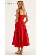 Yellow Alina waist dress by Lumina Vancouver, elegant and flattering wedding guest dress with chic style and feminine silhouette.