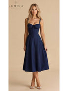 Yellow Alina waist dress by Lumina Vancouver, elegant and flattering for wedding guests, with chic, fitted design.