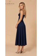 Yellow Alina waist dress by Lumina Vancouver, elegant and chic wedding guest dress with a flattering fit.