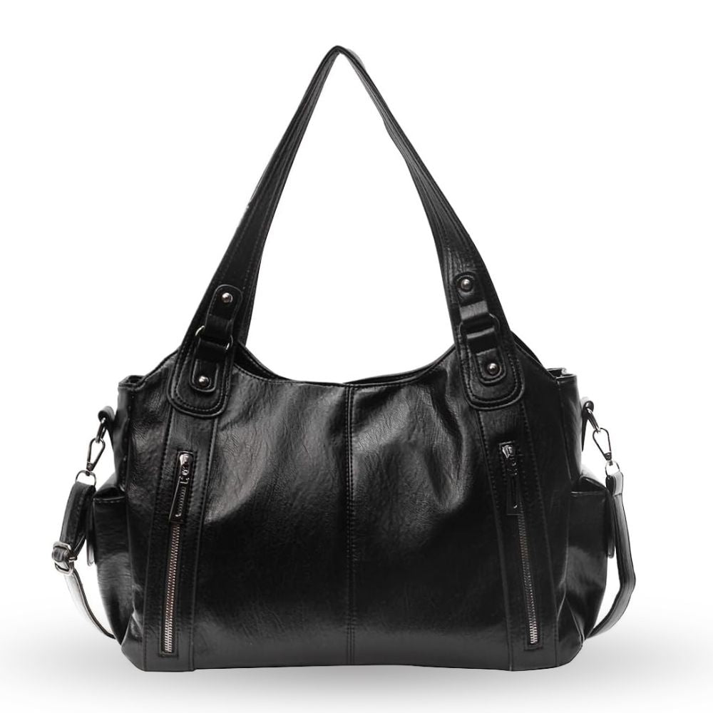 Black Lumina Wear Aliona backpack with versatile design, featuring multiple compartments and stylish black fabric for school or daily use.