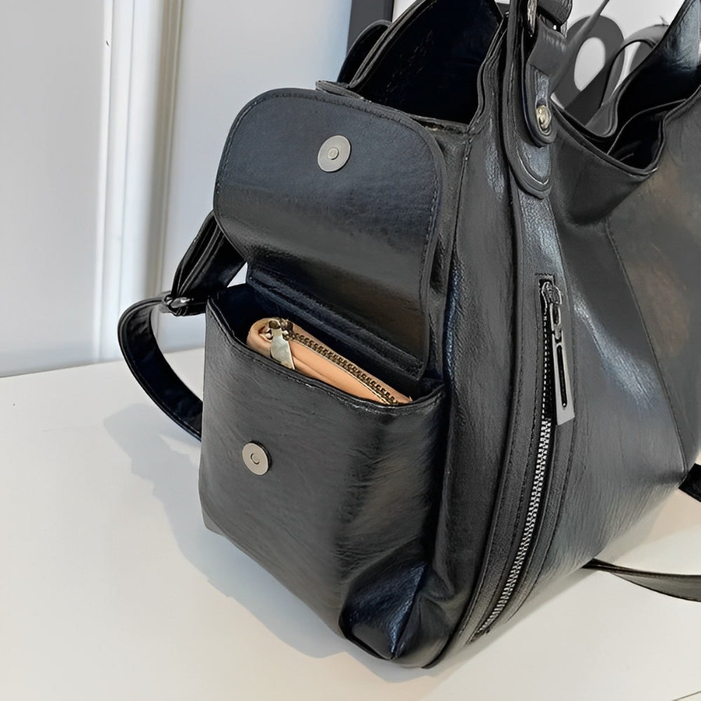 Aliona black school backpack by Lumina Wear, featuring versatile compartments and stylish design for students.