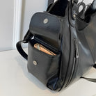 Aliona black school backpack by Lumina Wear, featuring versatile compartments and stylish design for students.