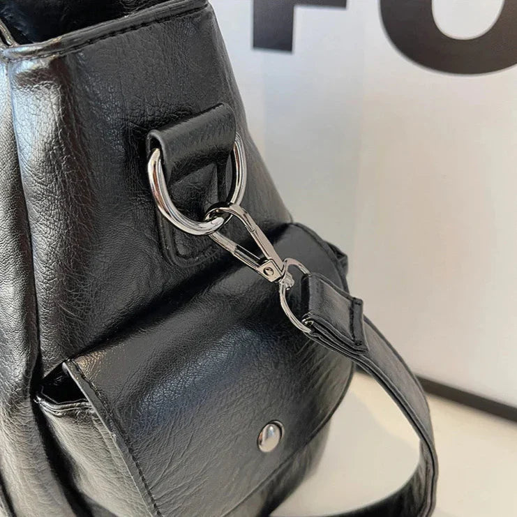 Black Lumina Wear Aliona backpack with multiple compartments and adjustable straps, designed for stylish school use.