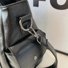 Black Lumina Wear Aliona backpack with multiple compartments and adjustable straps, designed for stylish school use.